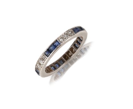 A sapphire and diamond eternity ring, early 20th century, of full eternity design, set with alternating trios of single-cut d