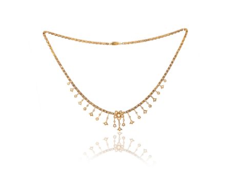 A Victorian seed pearl fringe necklace, with a flowerhead centre, on fancy-link yellow gold chain, 40cm long
