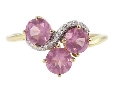 9ct gold three stone pink sapphire and diamond ring, hallmarked Condition Report:Approx 1.85gm, size N-O, well presented ring