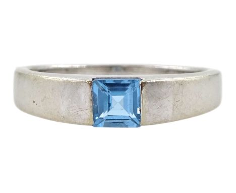 9ct white gold tension set single stone square cut blue topaz ring, hallmarkedCondition Report:Approx 2.3gm, size M-N, yellow