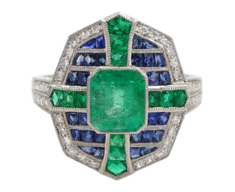 Platinum emerald, sapphire and diamond dress ring, with diamond set shoulders, stamped Plat, emerald approx 1.08 carat, total