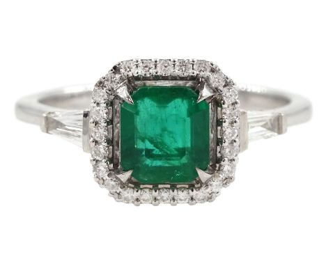 18ct white gold cushion cut emerald and round brilliant cut diamond ring, with tapered baguette diamond shoulders, emerald ap