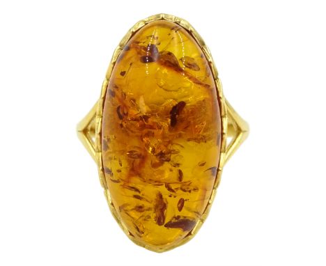 Silver-gilt oval Baltic amber ring, with pierced gallery and shoulders, stamped 925Condition Report:Size R-S, depth = 25mm, w