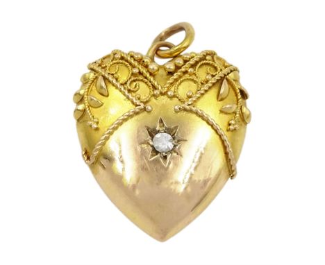 Victorian Etruscan revival gold heart shaped pendant, set with a single old cut diamond, stamped 15ctCondition Report:Approx 