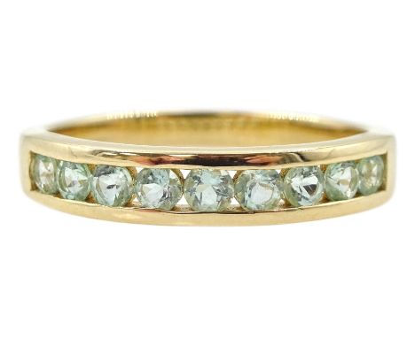9ct gold channel set blue beryl ring, hallmarked Condition Report:Approx 3gm, size R-S, well presented ring in very good cond