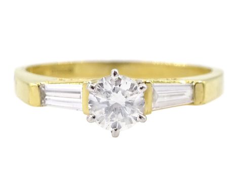 18ct gold round brilliant cut diamond ring, with tapered baguette diamond shoulders, London 2001, principle diamond approx 0.