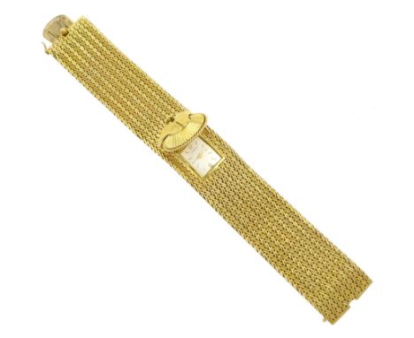Garrard 18ct gold ladies manual wind wristwatch, the watch concealed by knot design cover, on integral herringbone link brace