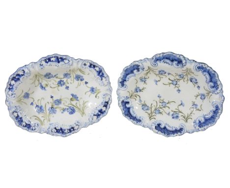  A pair of James Macintyre  &  Company shaped oval dessert dishes,   designed by William Moorcroft, tube-lined with blue four
