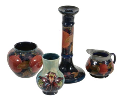  Pomegranate, a Moorcroft 8in candlestick,   impressed mark, green painted initials, 20.5cm high; Pomegranate, a Moorcroft ov