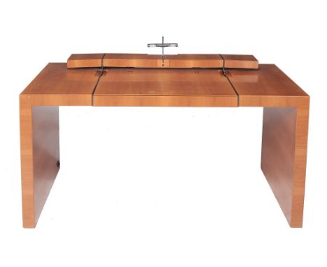  Jaime Tresserra Clapes (b. 1943), a walnut Lettera desk,   with fitted drawers, sycamore lined, tan leather pads and adjusta