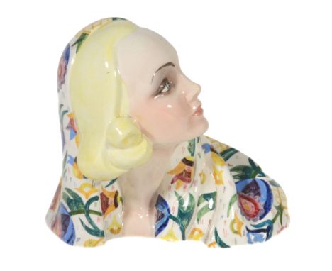  An Essevi pottery bust of a woman,   probably designed by Sandro Vachetti, with blonde curled hair, wearing a floral scarf, 