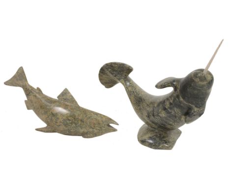  An Inuit carved serpentine and bone model of a narwhal,   unsigned, 35cm high, 43cm long; and a similar carving of a salmon,