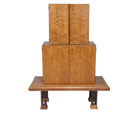  John Makepeace, OBE (b. 1939), a walnut Cluster double cabinet on stand,   the upper cabinet with two doors enclosing a sing