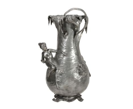  A WMF pewter large figural flower vase,   model no. 127, the leaf frond rim with a putti and leaf frond in relief, the body 