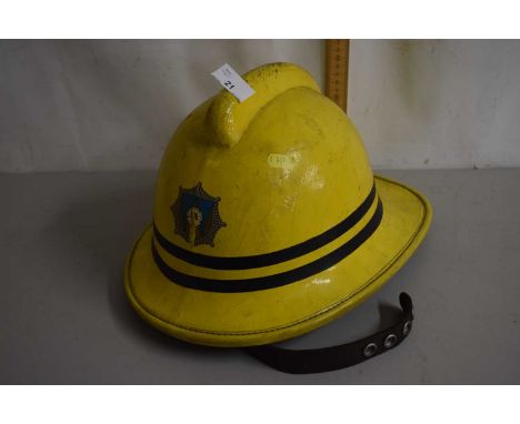 A vintage firemans helmet