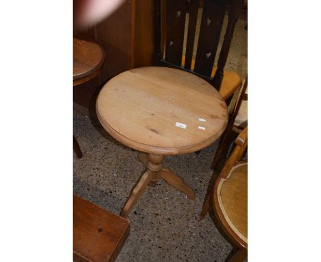 A pine wine table on turned column with tripod base