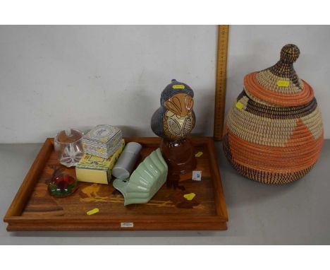 Tray containing various ceramic items including a model of a bird