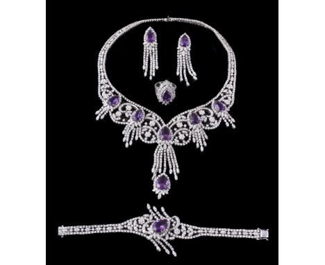 A diamond and amethyst suite, the necklace with articulated swags of diamonds with foliate diamond detail, with five graduate