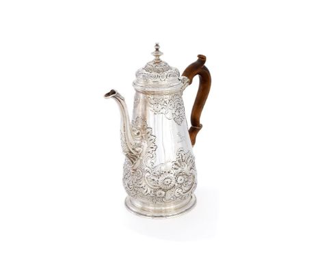 A George II silver baluster coffee pot, maker's mark worn (..B), London 1743, with a turned finial to the ogee domed cover, a