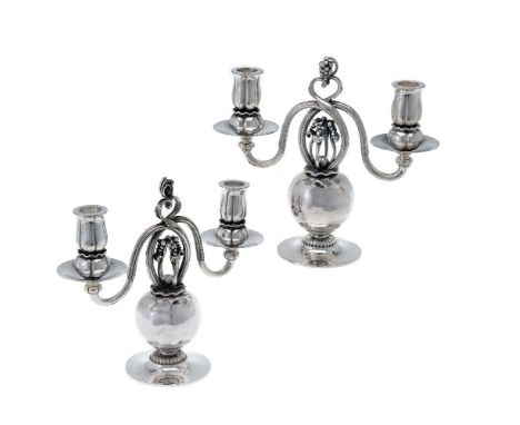 Georg Jensen, a pair of Danish silver Poppy twin light candelabra, post 1945 stamped marks, design no. 324, designed by Georg