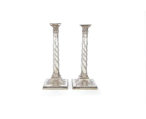 A pair of George III silver columnar candlesticks by Tudor &amp; Leader (Henry Tudor &amp; Thomas Leader), Sheffield 1773, th