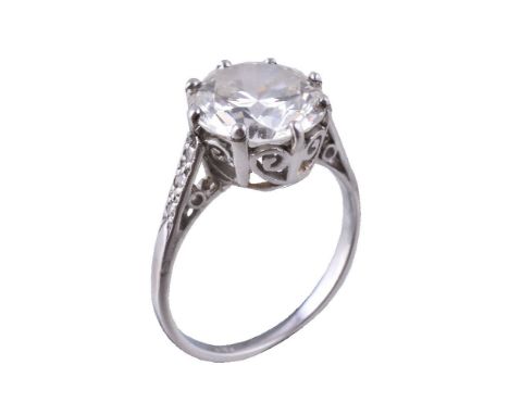 A 1930s single stone diamond ring, the brilliant cut diamond weighing 3.65 carats in an eight claw setting, to eight cut diam