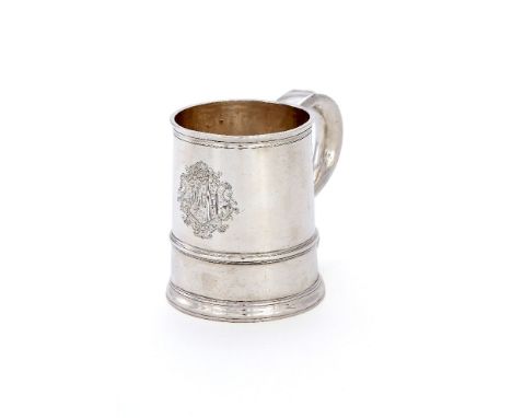 A Queen Anne silver straight-tapered mug by Edward Yorke, London 1713, Britannia standard, with a tongue-capped S-scroll hand