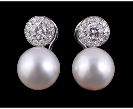 A pair of diamond and South Sea cultured pearl earrings, the brilliant cut diamond clusters, approximately 1.25 carats total,