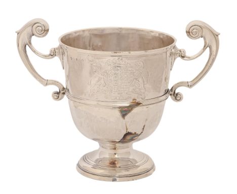 An Irish George II silver cup,&nbsp;with reeded girdle and engraved with contemporary achievement of arms, on moulded foot, 2