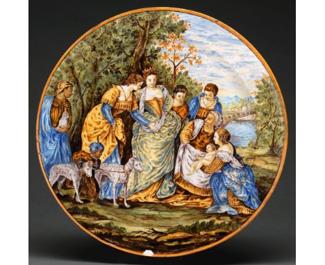 An Italian maiolica revivalist style dish, late 19th c, painted with the Finding of Moses in ochre rim, 37cm diam, indistinct