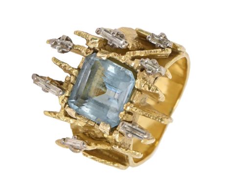 An aquamarine and diamond ring, of abstract form, in gold with textured band, 14.5g, size I  Good condition