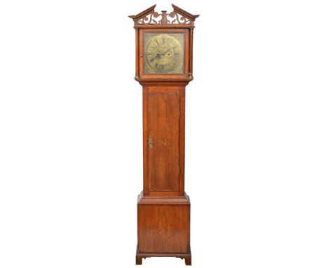 A George III oak eight-day longcase clock, Andrew Knowles, the 11.5 inch brass dial formerly with mock pendulum, date apertur