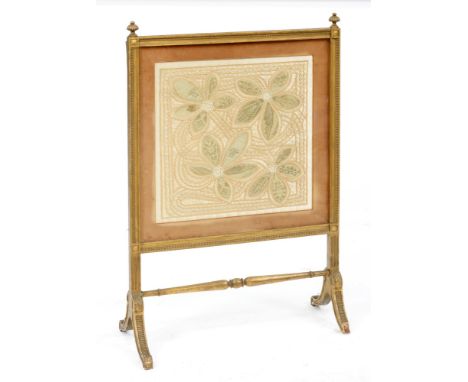 A giltwood firescreen, c1900,&nbsp;the silk covered back with magazine wallet, glazed needlework banner, 100cm h, 66cm w  gil