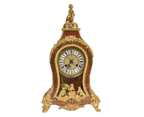 A French gilt brass mounted, ebonised and Boulle bracket clock, 19th c, in Louis XV style, the cast giltmetal dial with ename