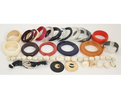 Costume jewellery. A faux ivory suite, necklace, bangle and earrings and miscellaneous acrylic and other bangles, transparent