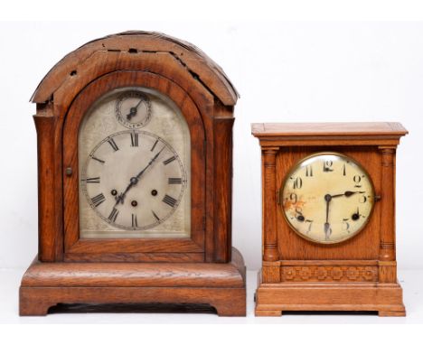 A German oak bracket clock, 19th c, with arched top silvered dial, the brass movement stamped Gustav Becker, pendulum and key