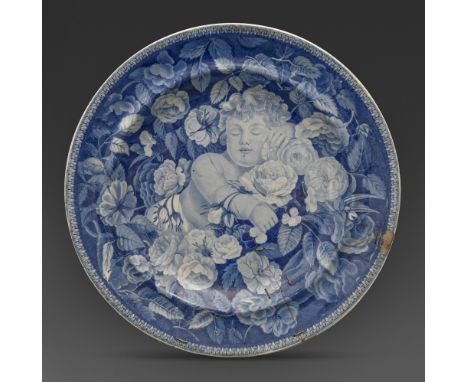 A rare Don Pottery blue printed pearlware Boy Slumbering Amidst Roses pattern plate, c1820, 26cm diam, printed lion mark, col