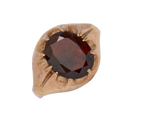 A garnet signet ring, in 9ct gold, marks rubbed, 4.8g, size S  Internal fractures evident under transmitted light