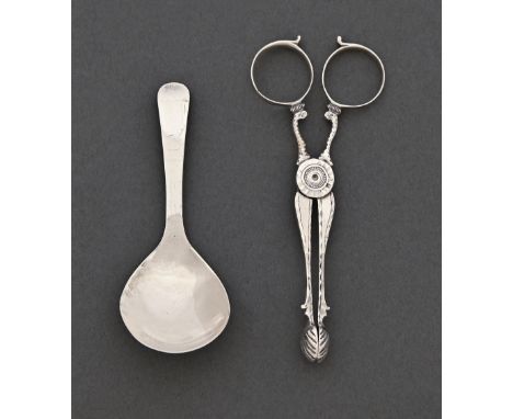 A pair of George II silver sugar tongs, by Jesse McFarlan [London, c1740] and a George III silver caddy spoon [London] 1807, 