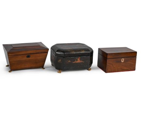 A Victorian rosewood tea caddy, of sarcophagus shape with giltmetal paw feet, 13cm h, contemporary rosewood square tea caddy,