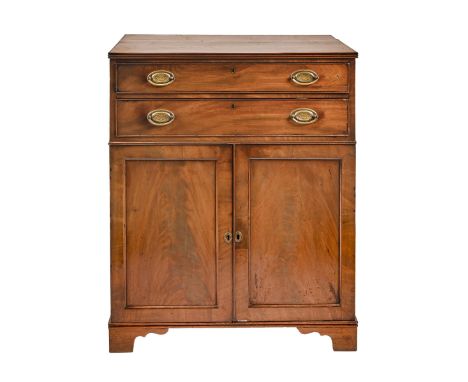 A George III mahogany cupboard, fitted with a shelf beneath two drawers, 102cm h; 50 x 82.5cm  Good condition for age, panels