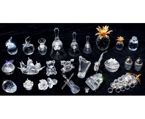Swarovski.&nbsp;A collection of glass fruit,&nbsp;to include grapes, pineapple, apple and pear; musical instruments, two trin