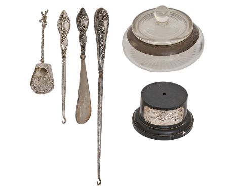 A decorative Dutch silver windmill caddy spoon, c1900, 12.5cm l, two silver handled button hooks and two other items, etc  Ev