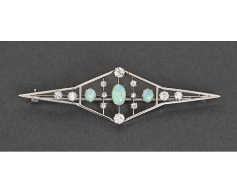 An art deco opal and diamond brooch, c1940, in white gold, 79mm l, marked 18ct, 10.3g  Fine quality and condition, opal retai