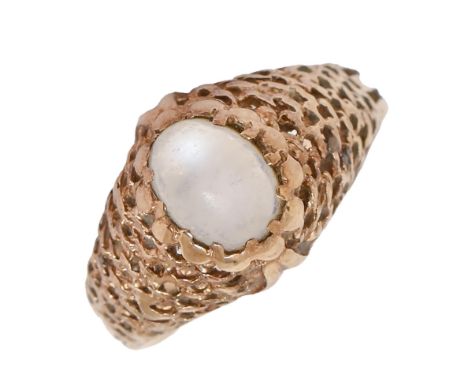 A moonstone ring, in 9ct gold, London 1972, 3.8g, size K  Moonstone scratched from wear