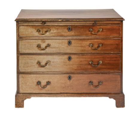 A George III mahogany chest of drawers,&nbsp;with brushing slide, on bracket feet and brass castors, 80cm h; 93 x 47cm  Some 