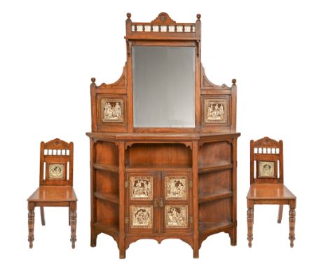 A Victorian walnut and ebonised cabinet and pair of closely matching oak side chairs, c1880, the cabinet and mirror back inse