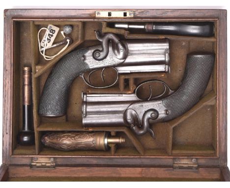 &nbsp;A pair of 34 bore double barrelled over and under percussion boxlock side hammer pistols, by Wilkinson, 7" overall, bar