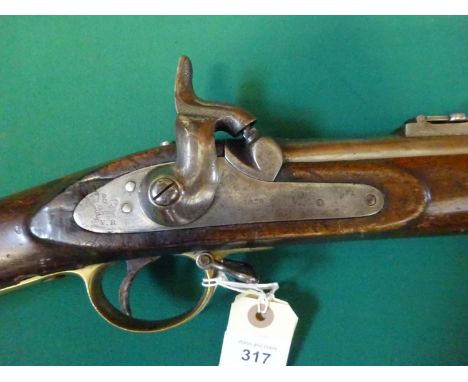 A .577" Enfield 3 band percussion rifle, barrel 39" with ordnance proofs and government sale mark (worn), the lock stamped wi
