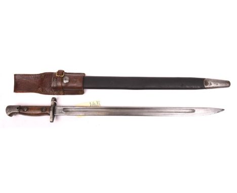 A 1907 Pattern bayonet, South African issue stamp to pommel, blade marked “11 18”, in its scabbard with South African pattern